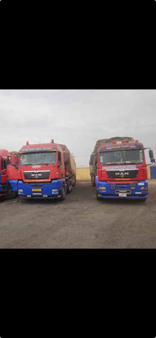 Company trucks lined up at the depot